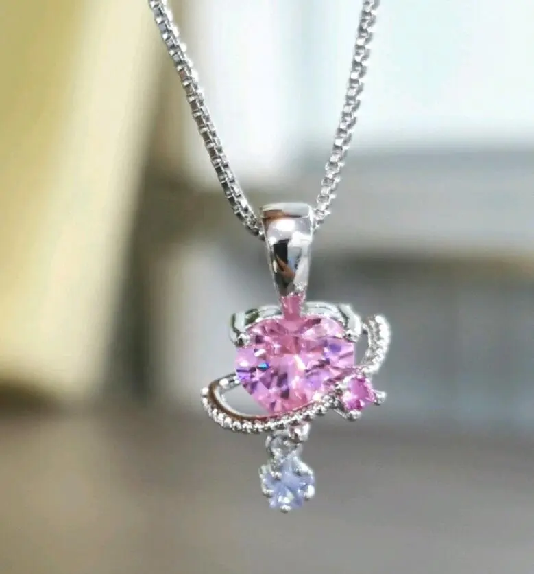 Produk baru pabrik langsung sederhana perhiasan lucu Planet Huggie hati merah muda liontin Zircon kalung wanita