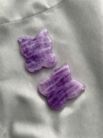 Planche Gua Sha en améthyste en forme de papillon