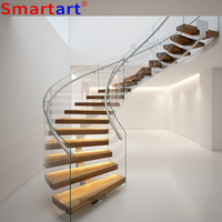 Escalier en colimaçon intérieur moderne, durable et écologique avec main courante en verre trempé et construction en acier inoxydable, certifié ISO9001