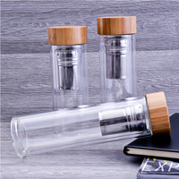 Dinding Ganda Terisolasi Premium Tinggi Borosilikat Kaca Teh Infuser Botol Air Buah dengan Tutup Bambu Anti Bocor