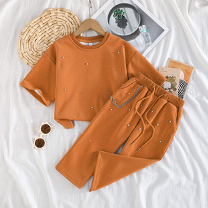 Completo Estivo Casual in Cotone per Bambini, Stile Europeo e Americano, con Pantaloncini e Maglietta a Maniche Corte con Strass, Set Due Pezzi per Bambini Piccoli - Product Image 1