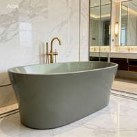 Baignoire autoportante moderne en acrylique écologique, finition nacrée jade, avec drain inclus, pour usage intérieur en salle de bain d'hôtel