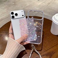 Nouvelle coque de téléphone de luxe à motif coquillage avec nœud papillon en papier pour iPhone 18 17 16 15 14 Pro Max avec cordon perlé et protection antichoc