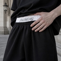 Pantalon de jogging ample pour homme, taille élastique, cordon de serrage, bord côtelé intérieur, style streetwear, personnalisable OEM