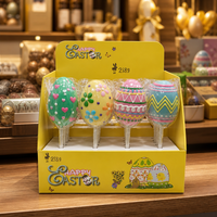Vente en gros de sucettes dures en forme d'œuf de Pâques de 40 g, assortiment de motifs floraux en forme de cœur, cadeau de fête festif dans une boîte PDQ personnalisée