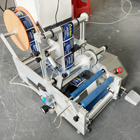 Applicateur semi-automatique d'étiquettes autocollantes en papier pour bouteilles rondes étiqueteuse de bouteilles rondes pour bouteilles en plastique et en verre