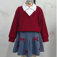 Ensemble deux pièces automne-hiver 2026 pour filles : haut en tricot patchwork à manches longues et jupe en jean ornée d'un nœud – Tenues pour filles