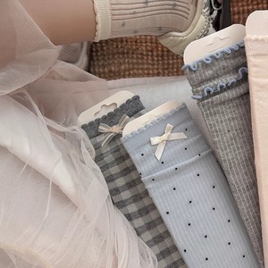 Chaussettes mi-mollet pour femmes, style décontracté, motif nœud, respirantes, en fibre de polyester, chaudes, style jeune - Product Image 1