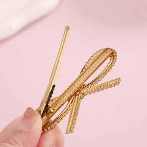 Luxury <b>Bow</b> Hair <b>Clip</b> Alloy Side <b>Clip</b> For Women Daily Use Heart Shaped Design Yiwu Origin Winter 2024 - Product Image 1
