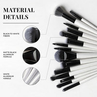 Ensemble de 15 pinceaux de maquillage, base noire, poils synthétiques à pointe blanche, ferrules en aluminium noir mat, manches peints en blanc