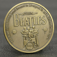 Pièce commémorative double face du groupe britannique The Beatles 1960-1970