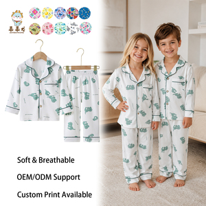 Set <span class=keywords><strong>pigiama</strong></span> per bambini in cotone Guai <span class=keywords><strong>con</strong></span> stampa di <span class=keywords><strong>dinosauri</strong></span> e top <span class=keywords><strong>con</strong></span> bottoni per un comodo <span class=keywords><strong>pigiama</strong></span> e coordinato per la famiglia - Product Image 1