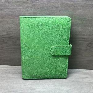 Carnet A5 personnalisé en gros, couverture en cuir PU coloré haut de gamme avec bouton magnétique, idéal pour les voyages, le bureau, les affaires ou comme journal intime. - Product Image 5