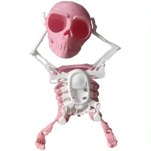 Injection molded rocking skull dancing figurine manual funny skull winding rotating decompression creative toy