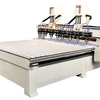 Routeur CNC multi-broches 1325 à têtes multiples pour la sculpture sur bois, la fabrication d'objets en bois massif, la gravure en relief des portes d'armoires