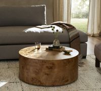Table basse ronde moderne avec plateau en bois de cerisier et structure en acier inoxydable, design simple fait main pour salon