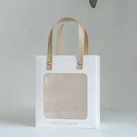 Sacs cadeaux en papier avec fenêtre en PVC unique en carton en gros avec poignée en ruban à nœud papillon