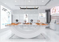 Présentoir de Magasin d'Optique Blanc à Trois Compartiments, Table Îlot avec Pieds Métalliques et Base à Tiroirs, Certifié CE ETL pour Magasin d'Optique