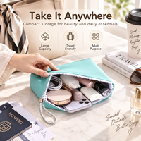 Pochette cosmétique en silicone personnalisée, étanche, pour voyage, avec sangle de poignet, options de logo OEM et fermeture éclair