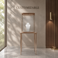 Vitrine à bijoux sur mesure en or rose avec vitrine en verre pour boutique de bijoux de marque, distributeur et design d'intérieur