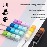Jouet de décompression en plastique, couleur unie, macaron, porte-clés à quatre touches, petit pendentif anti-stress