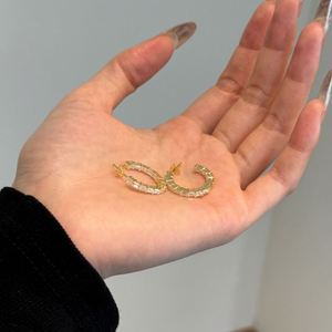 Pendientes de Aro en Forma de C de Dylam Stylish Jewellery, Accesorios de Joyería con Plata de Ley y Circonita Cúbica Baguette 5A - Product Image 4