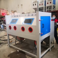 Équipement de sablage sur mesure pour le nettoyage abrasif à l'eau des pièces métalliques dans les applications d'atelier et industrielles