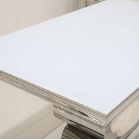 Table à manger moderne en verre super blanc, acier inoxydable, argent