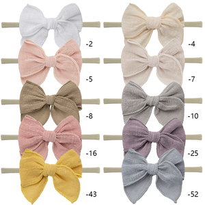 女婴棉麻迷你寓言蝴蝶结头带甜美柔和颜色弹性尼龙发带新生儿发饰 - Product Image 2