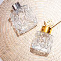 Diffuseur de parfum de luxe en verre, grand format 50ml 100ml, bouchon en caoutchouc, design taillé en diamant, couleur et logo personnalisés