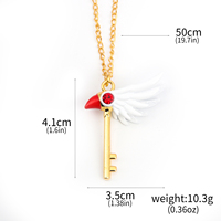 Collier Clé Ailée, Pendentif Clé Oiseau Doré, Ensemble Collier et Porte-clés Clé Fantaisie, Bijoux Cosplay Anime avec Cristal Rouge