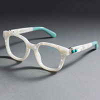 Monture de lunettes de luxe OEM ODM Lunettes personnalisées en acétate de coquillage blanc avec incrustation de pierres précieuses turquoises Lunettes de vue de créateur uniques