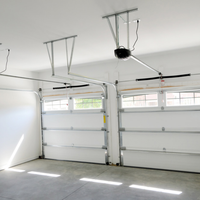 Puerta Seccional Industrial de Gran Tamaño Personalizada, Ofrece Amplio Paso para Acceso de Camiones y Montacargas en Instalaciones de Almacenes