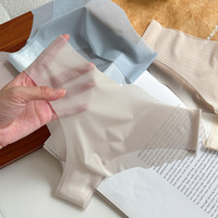Culotte string invisible en soie glacée, extensible et sans couture, taille basse pour femme, idéale pour l'été et les rendez-vous (faible MOQ)