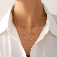 Collier minimaliste léger de luxe en forme de cœur creux en acier inoxydable PVD plaqué or 18K Chaîne de clavicule pour femme