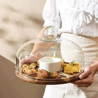 Bandeja de madera con tapa de cristal para tartas, postres y aperitivos, con patas de madera y estante de exhibición.