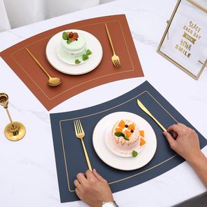 แผ่นรองจานหนังสั่งทำโลโก้โรงงาน แผ่นรองโต๊ะอาหารตกแต่ง ป้องกันความร้อน - Product Image 1