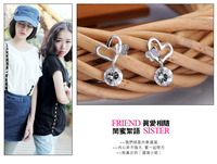 Vente en gros de boucles d'oreilles mode coréenne en argent sterling 925 pour femmes, bijoux tendance en plaqué or style baiser papillon