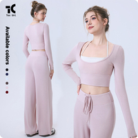 Haut à col halter uni, col rond, taille haute, manches longues, bonnets semi-fixés, sensation seconde peau, respirant, maintien thermique, coupe ample et large