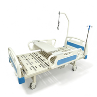 Lit médical manuel durable avec tête de lit en ABS pour les soins à domicile et la réadaptation