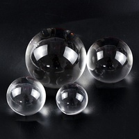 Boule de cristal K9 de haute qualité avec forme ronde transparente et effet de réfraction optique pour décoration