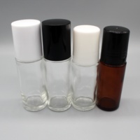 Cylindrique personnalisé 30ml 50ml Conteneurs de déodorant de parfum en verre ambré Rouleau de pierres précieuses sur bouteilles