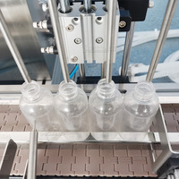 Remplisseuse automatique de boissons à 4 têtes Remplisseuse de lait en acier inoxydable Remplisseuse d'huile Remplisseuse de sauce au miel