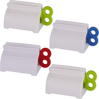 Porte-distributeur de dentifrice animal Tube roulant en plastique Pressoir Extrudeur de dentifrice Accessoires de salle de bain à domicile Fournitures