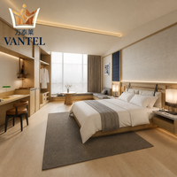 Ensemble de mobilier moderne pour chambre d'hôtel : lit, armoire, bureau, table de chevet et rangements sur mesure pour projets hôteliers