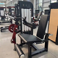 Machine à curls et extensions assises à charge libre DINUO, équipement de musculation pour le bas du corps, idéal pour les salles de sport et clubs.