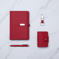 Ensemble cadeau d'affaires 4-en-1 de luxe en cuir rouge avec carnet A5 à feuilles mobiles, stylo, porte-clés et porte-cartes, personnalisable avec logo