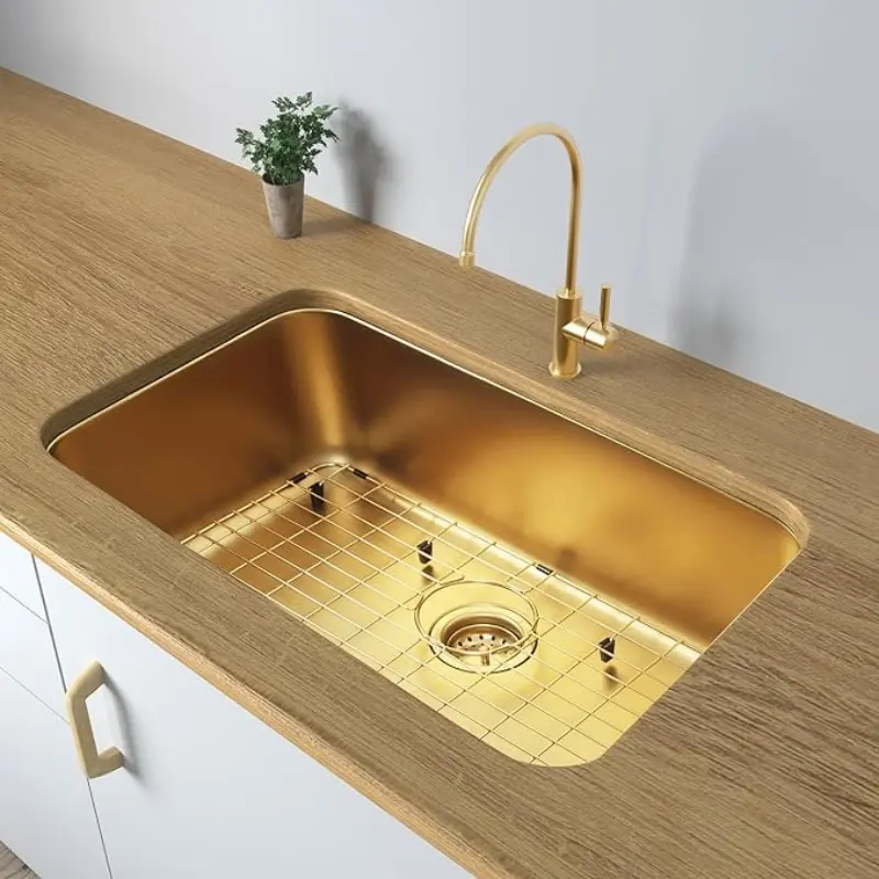 Gold kitchen sink installed under the countertop, luxurious sink, stainless steel nano handmade kitchen sink