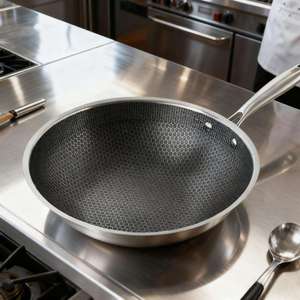 Poêle Wok en Acier Inoxydable Nid d'Abeille Antiadhésive Écologique Capacité 18L pour Cuisinières à Gaz et à Induction - Product Image 1