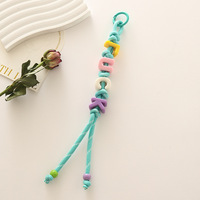 Nouveaux bracelets tressés faits main multicolores tendance, motifs créatifs, lettres, sangles de téléphone, porte-clés pour ma fille